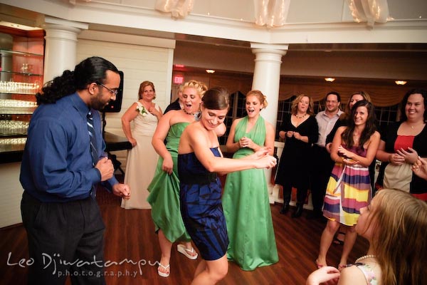 guests dancing, watched and joined by bridesmaids. Kent Manor Inn Wedding Photography Kent Island MD Photographer