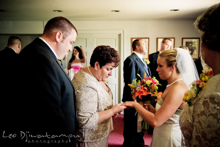 Mother of groom checking out bride's wedding ring. Kent Island Methodist Church KIUMC Wedding Photographer Maryland