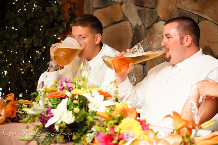Best man and groom drinking from das boot beer glass. Kent Island Flowers MD American Legion Wedding Photographer