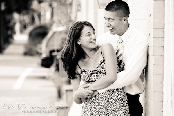 fiancee couple laughing, cuddling. fun candid engagement prewedding photo session Old Town Alexandria VA Washington DC