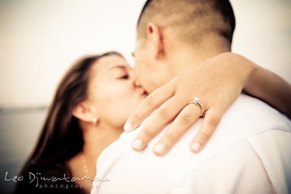 kissing showing ring. fun candid engagement prewedding photo session Old Town Alexandria VA Washington DC