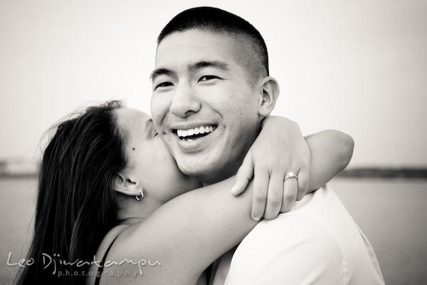 fiancee couple hugging, happy. fun candid engagement prewedding photo session Old Town Alexandria VA Washington DC