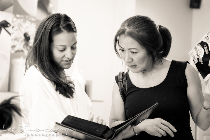 Bride and mother of groom looking at hair styles. Stafford Virginia Wedding Photographer