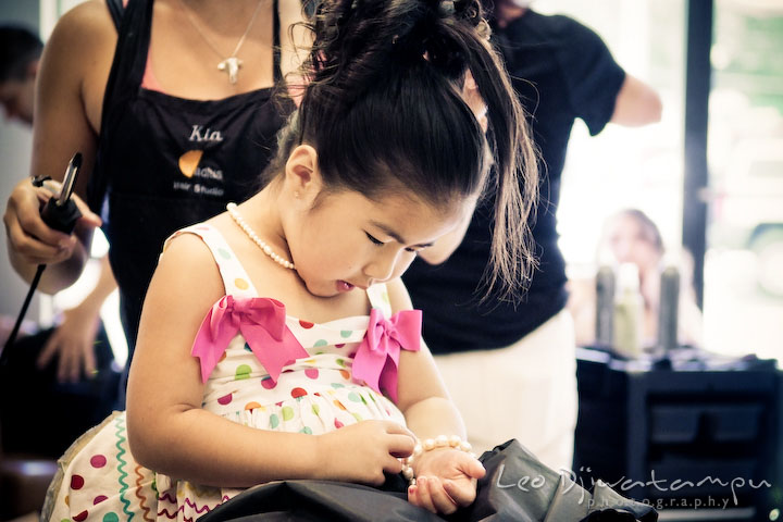Flower girl admiring her bracelet. Stafford Virginia Wedding Photographer