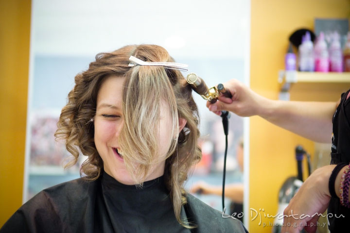 Girl laughing while getting her hair done. Stafford Virginia Wedding Photographer