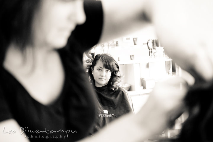 Bridesmaid getting her hair done. Black and white picture. Stafford Virginia Wedding Photographer