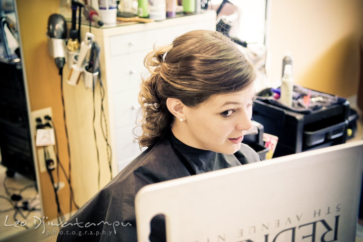 Girl checking out her new hair look. Stafford Virginia Wedding Photographer