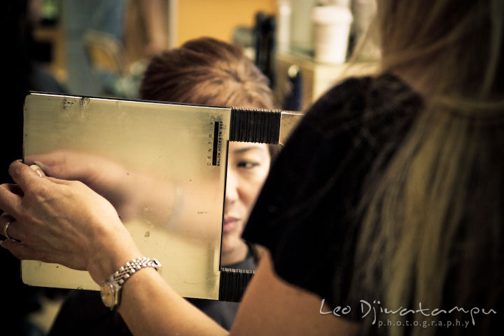 Mother of groom checking out her new hair look. Stafford Virginia Wedding Photographer