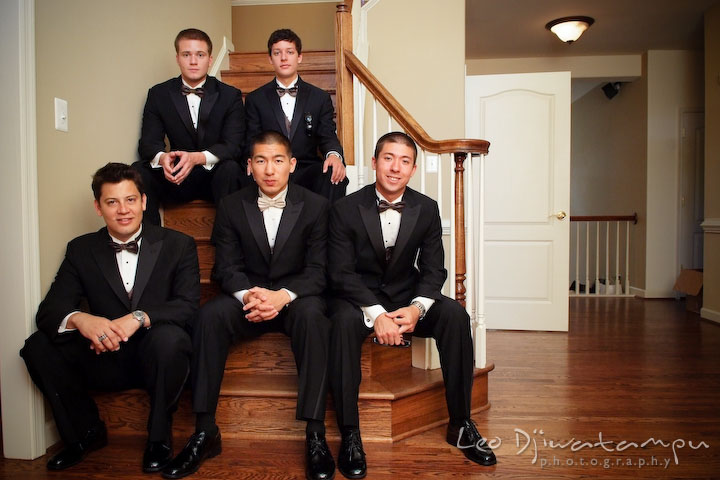 Groom, best man, groomsmen posing, sitting on the stairs. Stafford Virginia Wedding Photographer