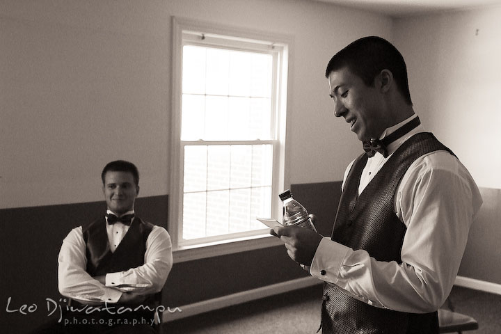Best man practicing his speech, witnessed by one of the groomsman. Stafford Virginia Wedding Photographer