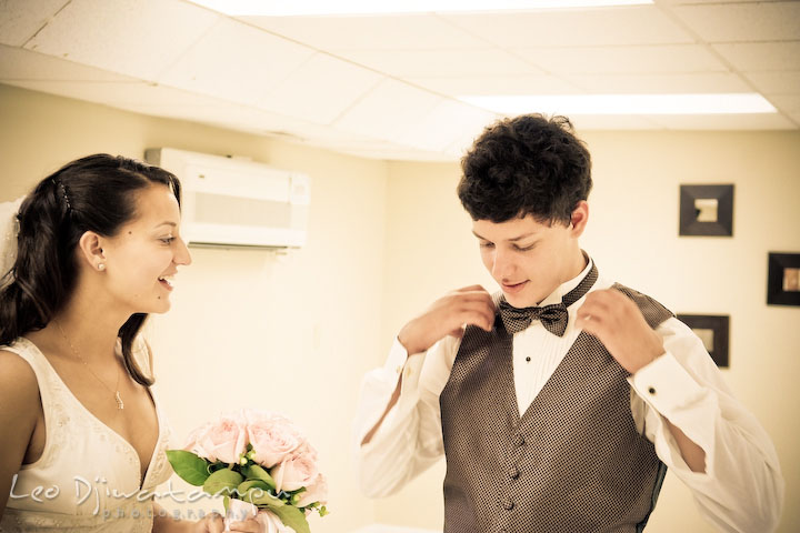 Bride talking with her brother, groomsman. Stafford Virginia Wedding Photographer