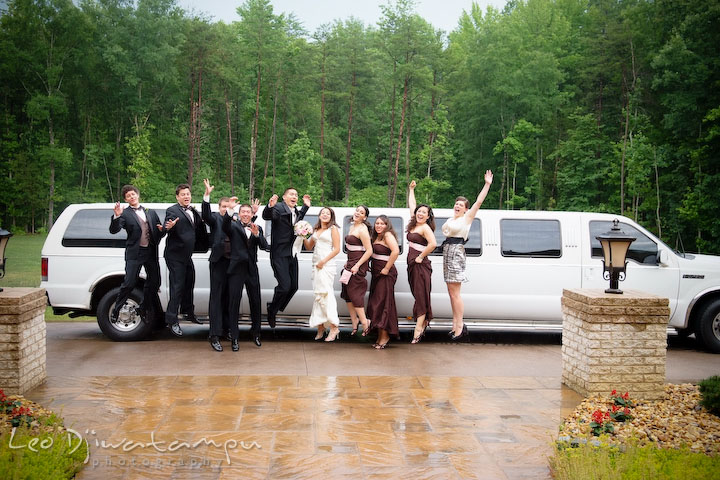 Bride, groom, bridal and groom party jumping by the white limo. Fredericksburg Square Wedding, Fredericksburg Virginia Wedding Photographer