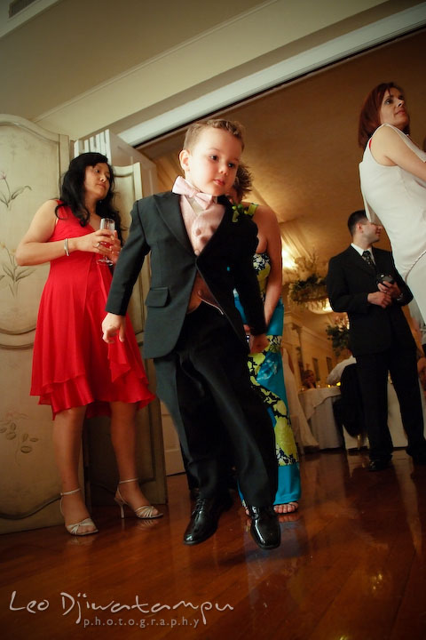 Ring bearer boy jumping and dancing. Fredericksburg Square Wedding, Fredericksburg Virginia Wedding Photographer