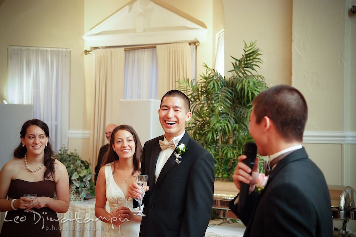 Maid of honor, bride and groom laughing listening to best man's speech. Fredericksburg Square Wedding, Fredericksburg Virginia Wedding Photographer