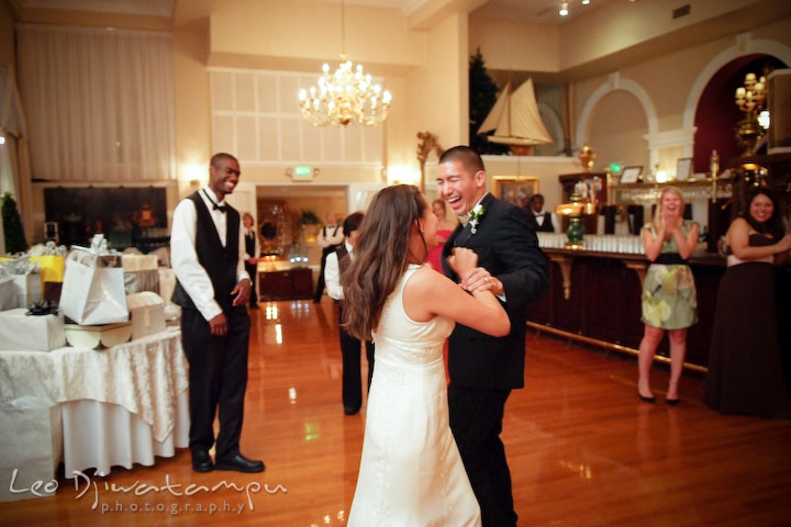 Bride and groom shoving cakes to each other's face. Fredericksburg Square Wedding, Fredericksburg Virginia Wedding Photographer