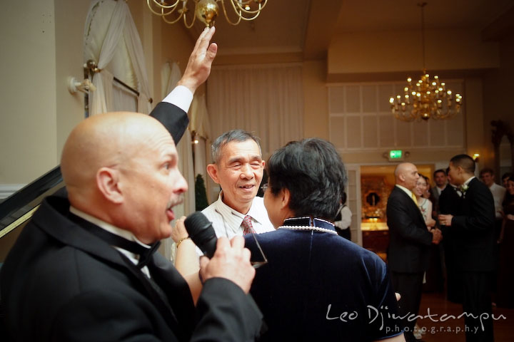 DJ Victor Gonzales announced the winner couple of the anniversary dance. Fredericksburg Square Wedding, Fredericksburg Virginia Wedding Photographer