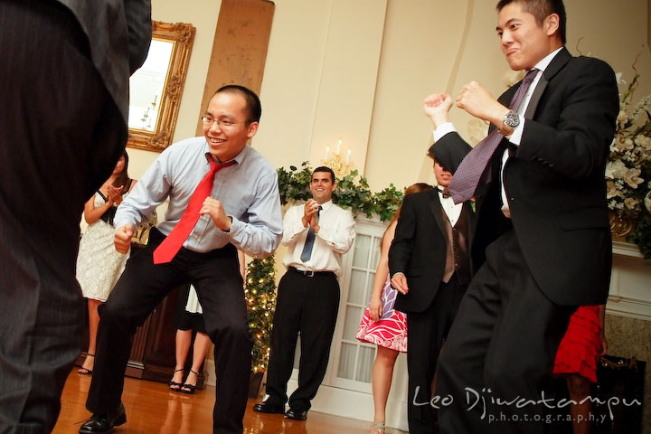 Two groom's friends dancing. Fredericksburg Square Wedding, Fredericksburg Virginia Wedding Photographer