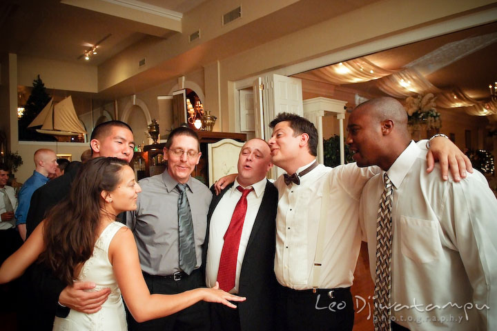 Bride, groom, groomsman, and other guests singing Queen's Bohemian Rhapsody. Fredericksburg Square Wedding, Fredericksburg Virginia Wedding Photographer
