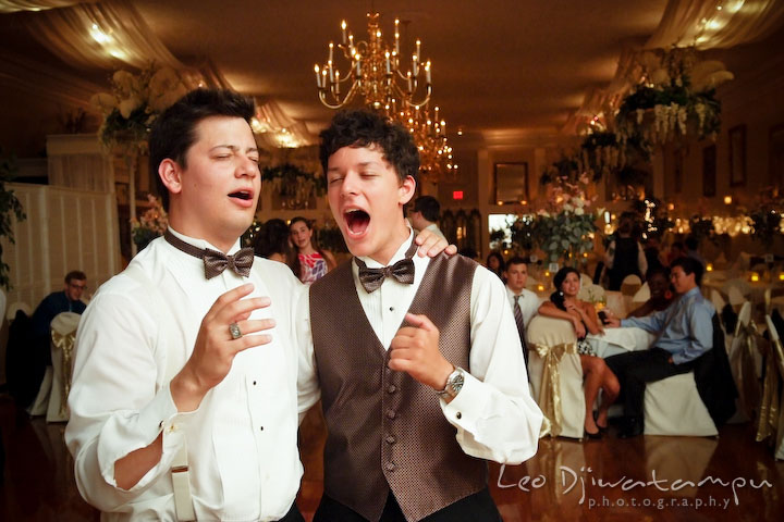 Two groomsmen singing Bohemian Rhapsody by Queen. Fredericksburg Square Wedding, Fredericksburg Virginia Wedding Photographer