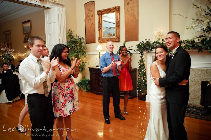 Guests applaud bride and groom at the end of the reception. Fredericksburg Square Wedding, Fredericksburg Virginia Wedding Photographer