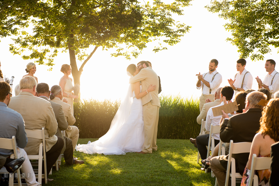 Chesapeake Bay Beach Club first kiss of Bride and Groom during the ceremony photo by Leo Dj Photography