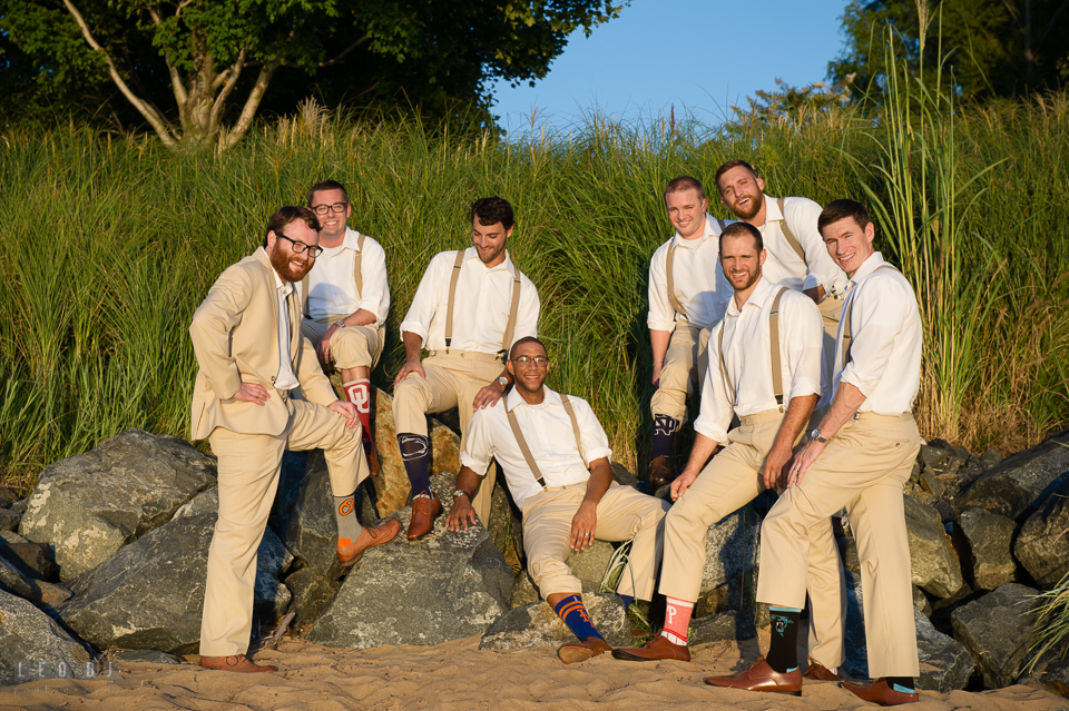 Chesapeake Bay Beach Club Groom with Groomsmen showing sports socks the beach photo by Leo Dj Photography