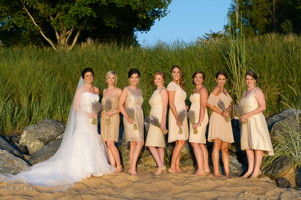 Chesapeake Bay Beach Club Bride with Bridal party posing on the beach photo by Leo Dj Photography