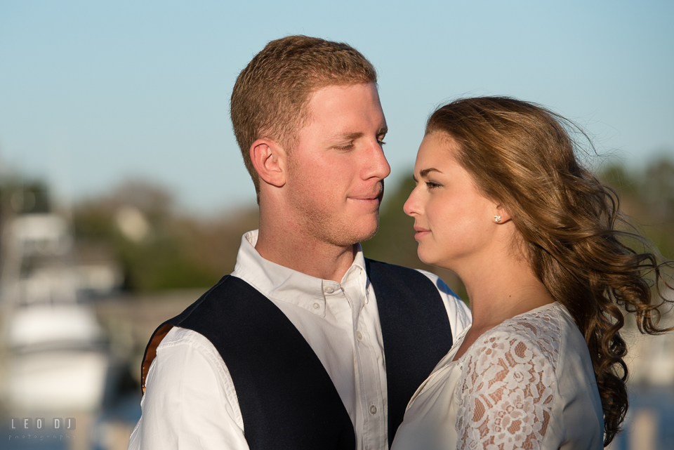 Cape Henlopen Lewes Delaware engaged man admiring his fiancée photo by Leo Dj Photography.