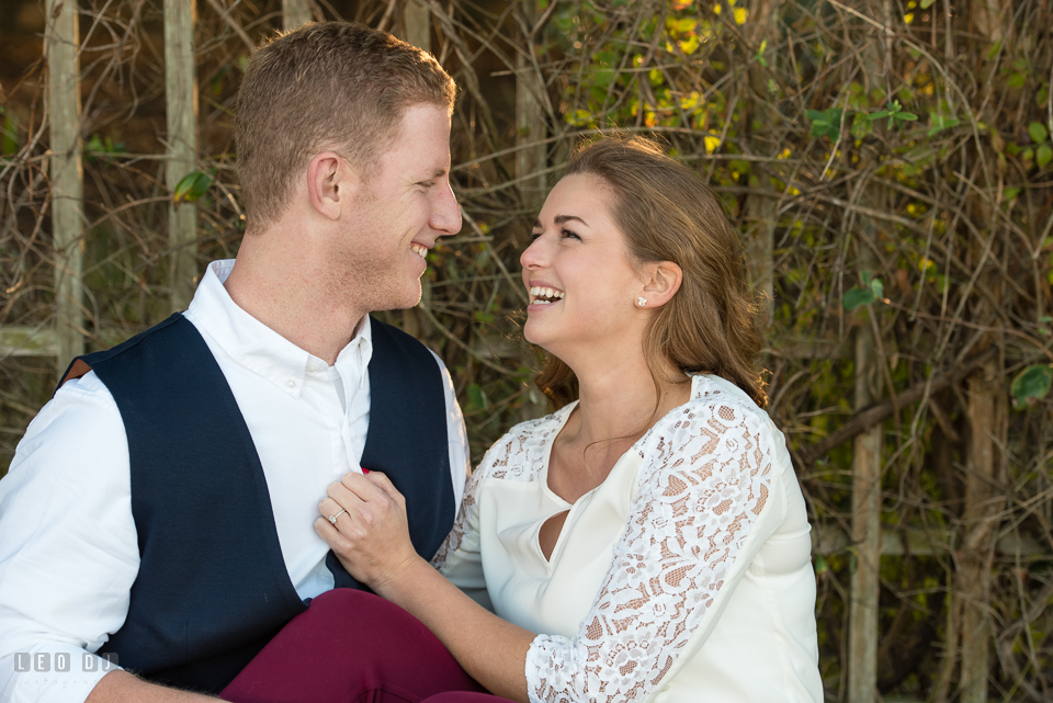 Cape Henlopen Lewes Delaware engaged couple laughing during engagement photo by Leo Dj Photography.