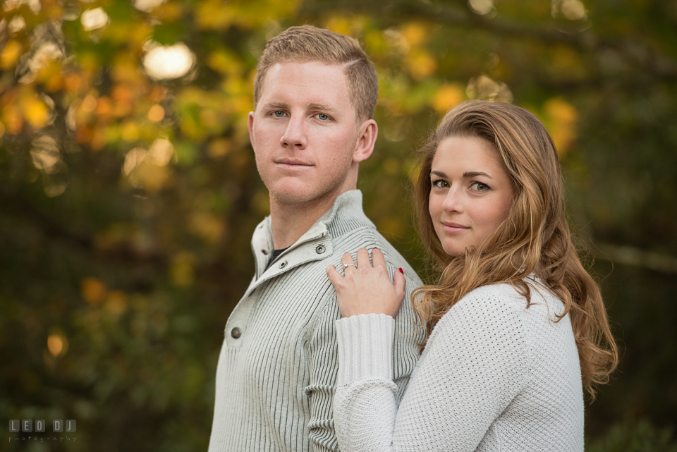Cape Henlopen State Park Delaware engaged girl posing with her fiance for engagement photo by Leo Dj Photography.