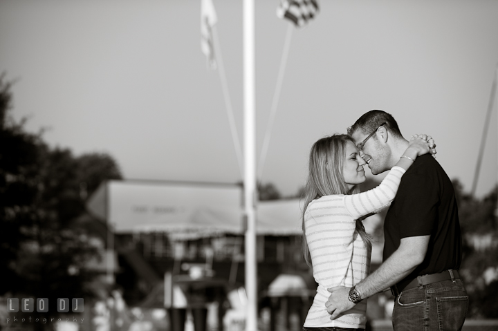 Engaged couple almost kissed. Pre-wedding engagement photo session at Annapolis city downtown harbor, Maryland, Eastern Shore, by wedding photographers of Leo Dj Photography. http://leodjphoto.com