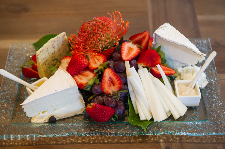 Appetizers of fruit, crackers, and cheese for the Bridal and Groom Wedding party in the Tavern Suite. Kent Island Maryland Chesapeake Bay Beach Club wedding ceremony and getting ready photo, by wedding photographers of Leo Dj Photography. http://leodjphoto.com