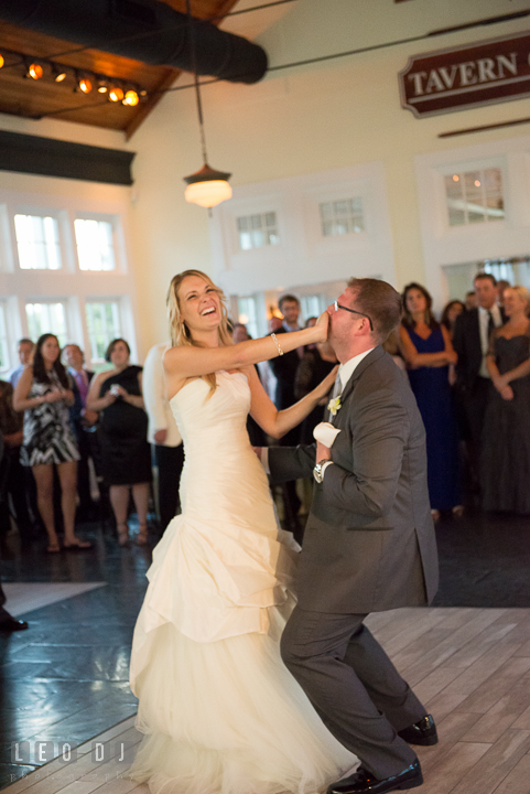 Bride covering Grooms mouth while performing their first dance. Kent Island Maryland Chesapeake Bay Beach Club wedding reception party photo, by wedding photographers of Leo Dj Photography. http://leodjphoto.com