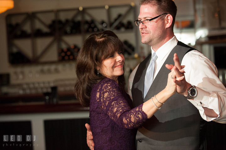 Groom dancing with Mother during parent dance. Kent Island Maryland Chesapeake Bay Beach Club wedding reception party photo, by wedding photographers of Leo Dj Photography. http://leodjphoto.com