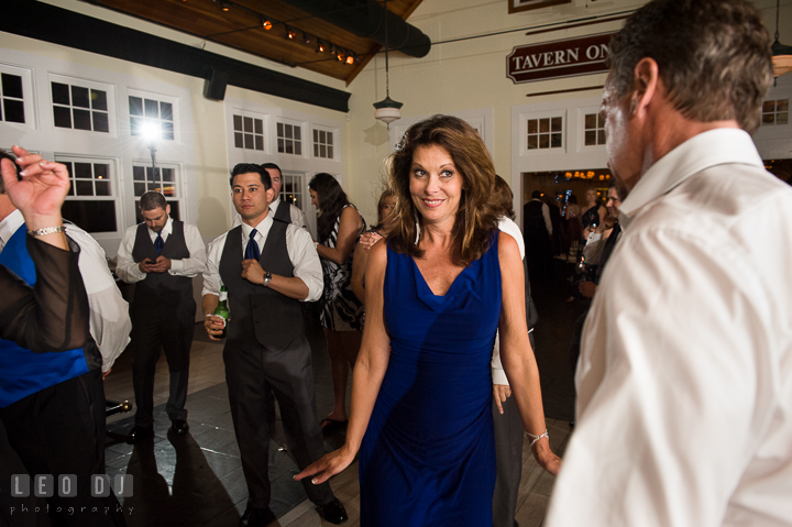 Mother of Bride having fun dancing with Father of Bride. Kent Island Maryland Chesapeake Bay Beach Club wedding reception party photo, by wedding photographers of Leo Dj Photography. http://leodjphoto.com