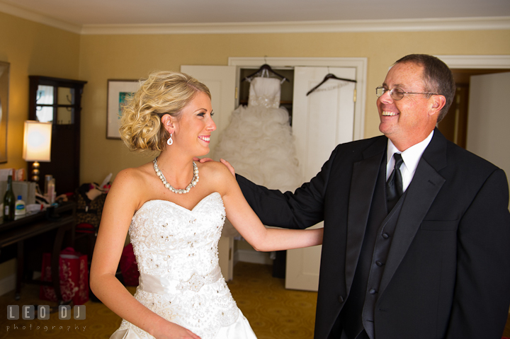 Father of Bride seeing daughter in wedding dress the first time. Getting ready wedding photos at Baltimore Marriott Waterfront by photographers of Leo Dj Photography. http://leodjphoto.com