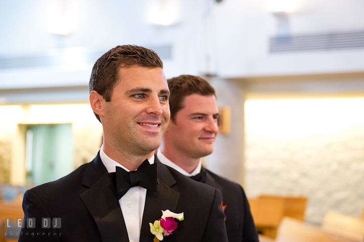 Groom and Best Man looking at Bride in wedding gown the first time. Ceremony wedding photos at Sacred Heart Church, Glyndon, Maryland by photographers of Leo Dj Photography. http://leodjphoto.com