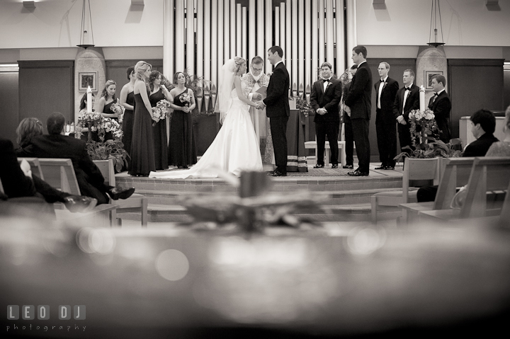 Bride and Groom reciting their vows. Ceremony wedding photos at Sacred Heart Church, Glyndon, Maryland by photographers of Leo Dj Photography. http://leodjphoto.com