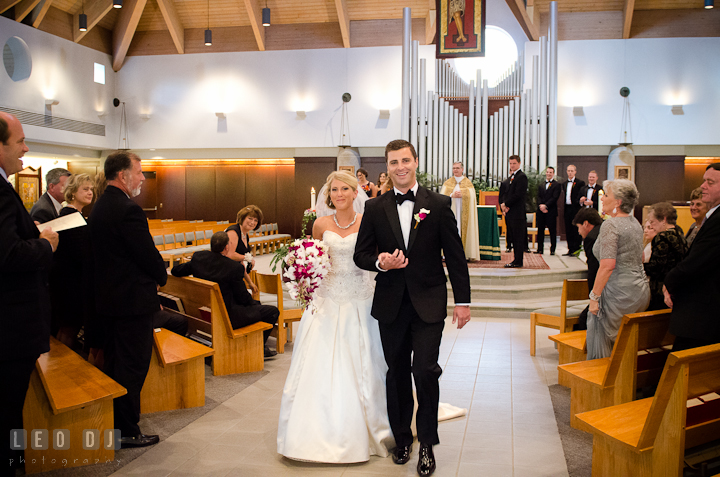 Bride and Groom walking out of the isle. Ceremony wedding photos at Sacred Heart Church, Glyndon, Maryland by photographers of Leo Dj Photography. http://leodjphoto.com