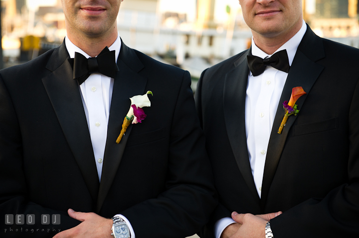 Groom and Best Man showing their boutonniere. Baltimore Museum of Industry wedding photos by photographers of Leo Dj Photography. http://leodjphoto.com