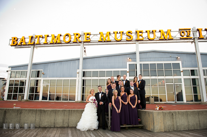 Bride and Groom with wedding party posing. Baltimore Museum of Industry wedding photos by photographers of Leo Dj Photography. http://leodjphoto.com