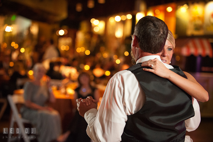 Bride hugging her Dad during father daughter dance. Baltimore Museum of Industry wedding photos by photographers of Leo Dj Photography. http://leodjphoto.com
