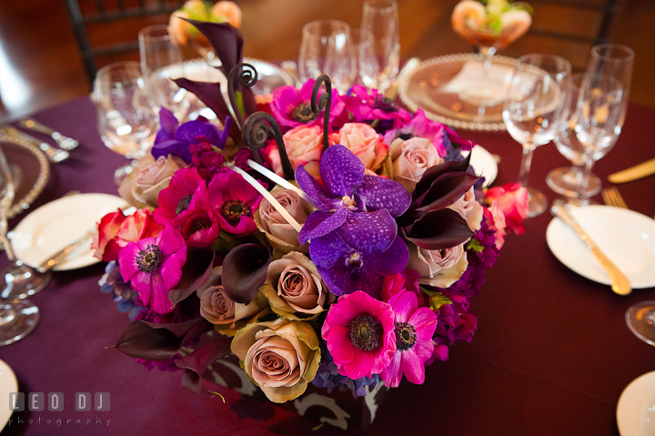 Blue, purple and pink floral table centerpiece by Intrigue Design and Decor. Chesapeake Bay Beach Club wedding bridal testing photos by photographers of Leo Dj Photography. http://leodjphoto.com