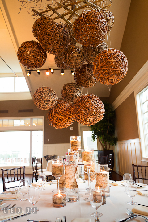 Suspended rattan balls and glass candle holders with birch tree barks as table centerpiece by Intrige Design and Decor. Chesapeake Bay Beach Club wedding bridal testing photos by photographers of Leo Dj Photography. http://leodjphoto.com