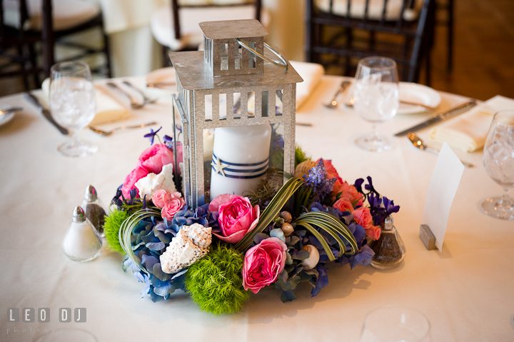 Candle lantern and flowers table centerpiece by Intrige Design and Decor. Chesapeake Bay Beach Club wedding bridal testing photos by photographers of Leo Dj Photography. http://leodjphoto.com