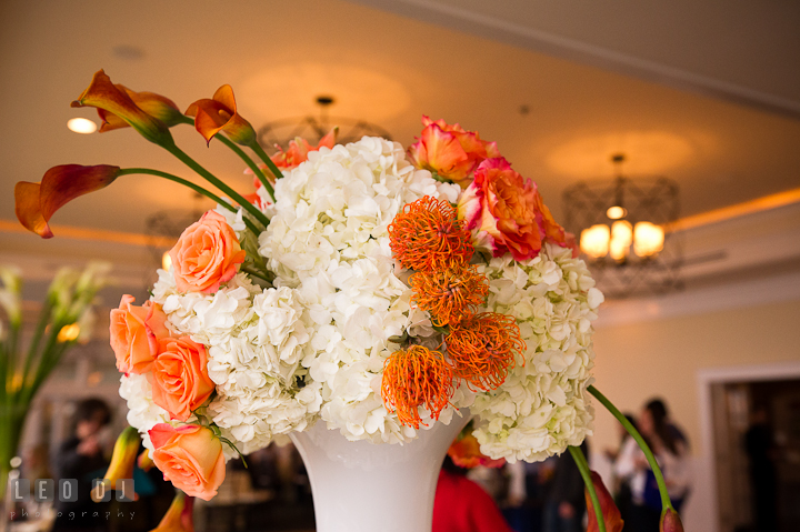 Orange calla lily and rose with white hydrangea table centerpiece by Intrige Design and Decor. Chesapeake Bay Beach Club wedding bridal testing photos by photographers of Leo Dj Photography. http://leodjphoto.com