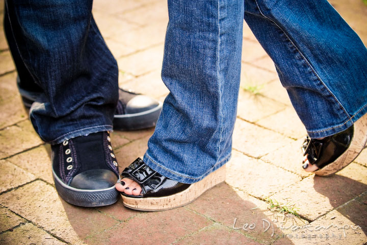 Black shoes, black nail polish from the engaged couple. Eastern Shore MD engagement pre-wedding photo session pier boat tattoo