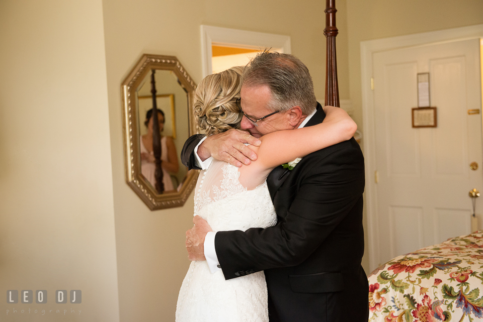 Eastern Shore Maryland bride hugging father during first look photo by Leo Dj Photography