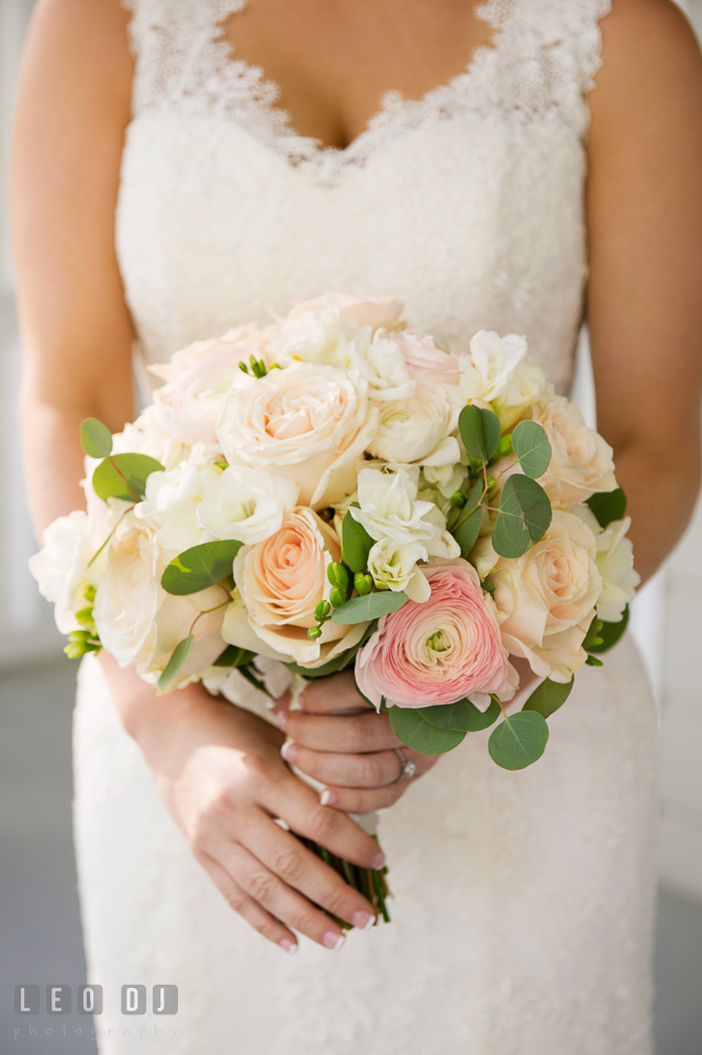 Kent Manor Inn bride holding pink and white rose bouquet by Cache Fleur photo by Leo Dj Photography