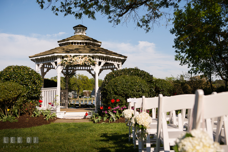 Kent Manor Inn gazebo and chairs decorated with flowers by Cache Fleur photo by Leo Dj Photography